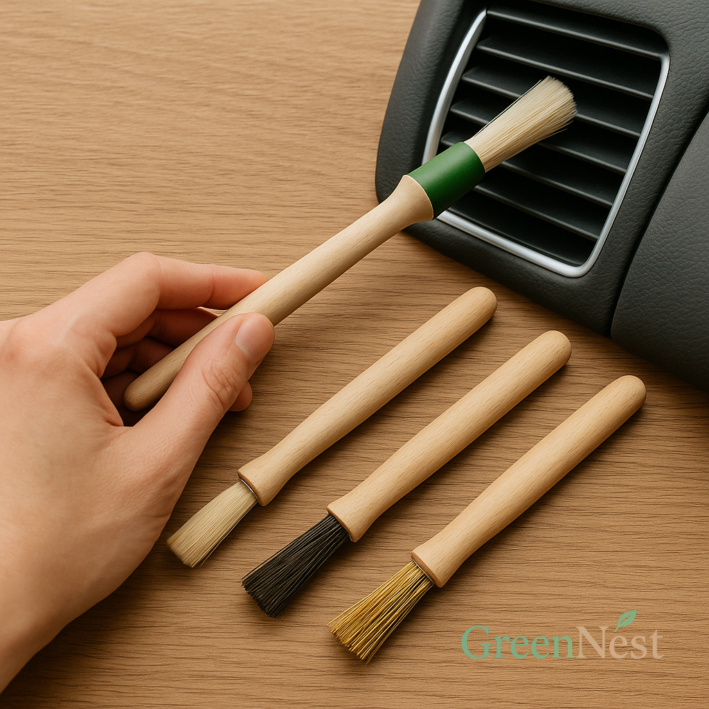 Eco-friendly detailing brushes with wooden handles arranged on a natural wood surface, with a hand using one brush to clean a black car air vent — ideal for precision cleaning in automotive and craft applications.